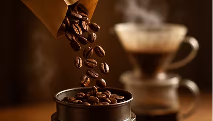 Fresh roasted coffee beans in a cup